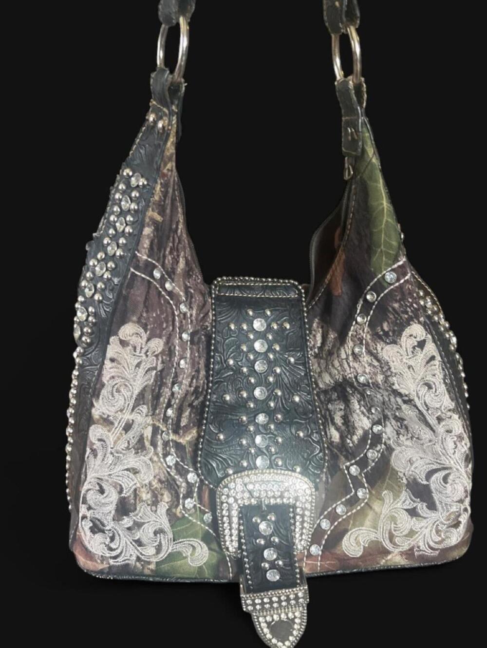 Camo print purse with silver rhinestones and studs.